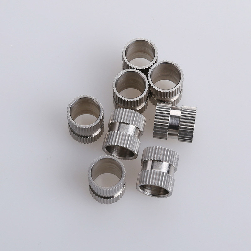 Двостороння вставна гайка